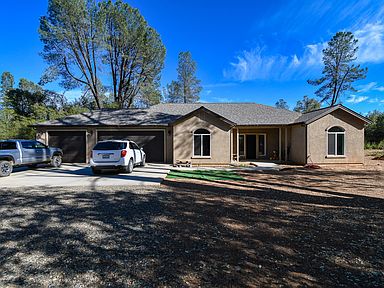 Meridian Cottonwood Brick Brown Long Panel Garage Doors Courtyard Driveway Porte Cochere Cupola Dark Bronze Gutters Gutters Garage Door Panels Brick