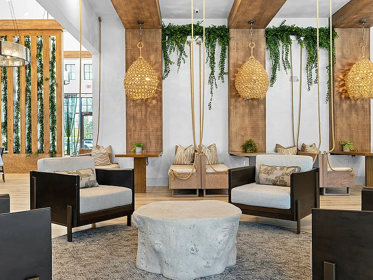 Immerse yourself in a blend of nature and contemporary style with this elegant lounge space.