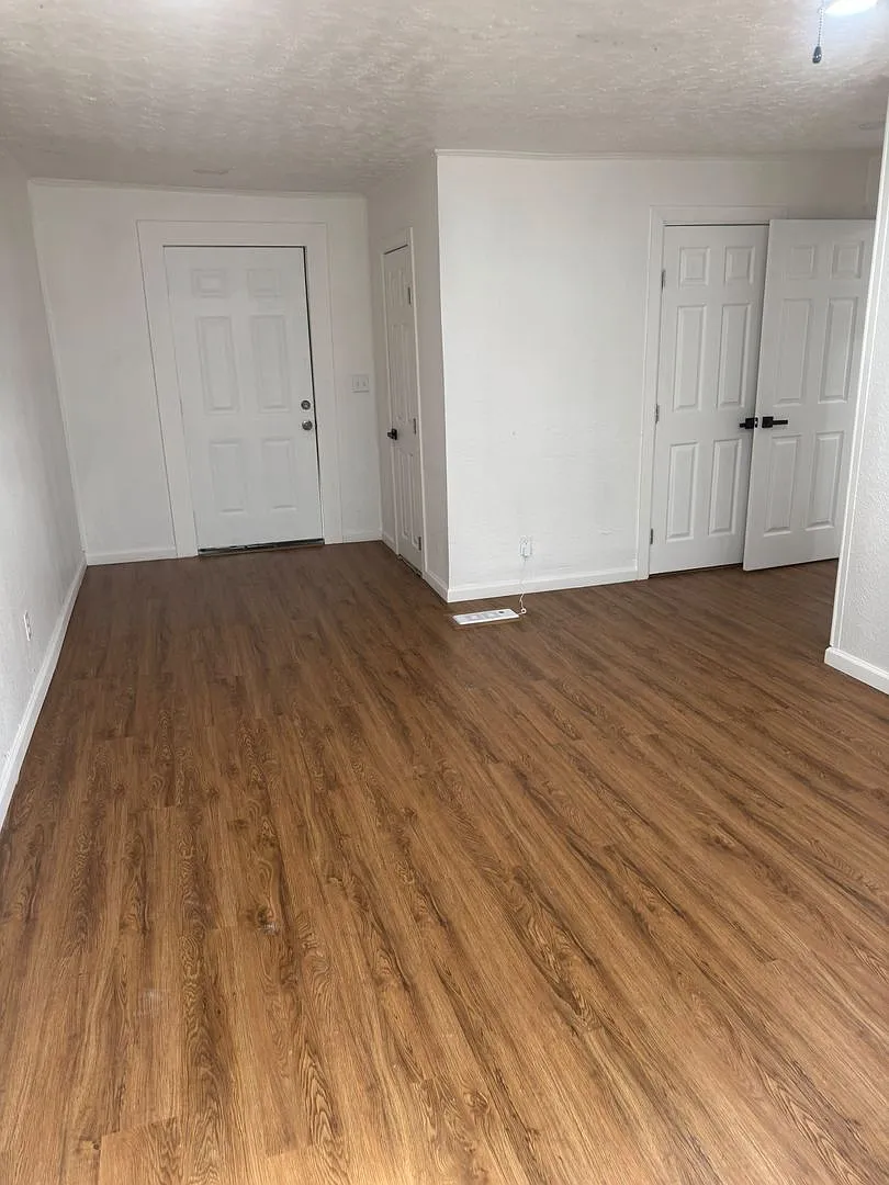 Spacious 5-Bedroom Home with Updated Kitchen & Large Deck — Photo 3