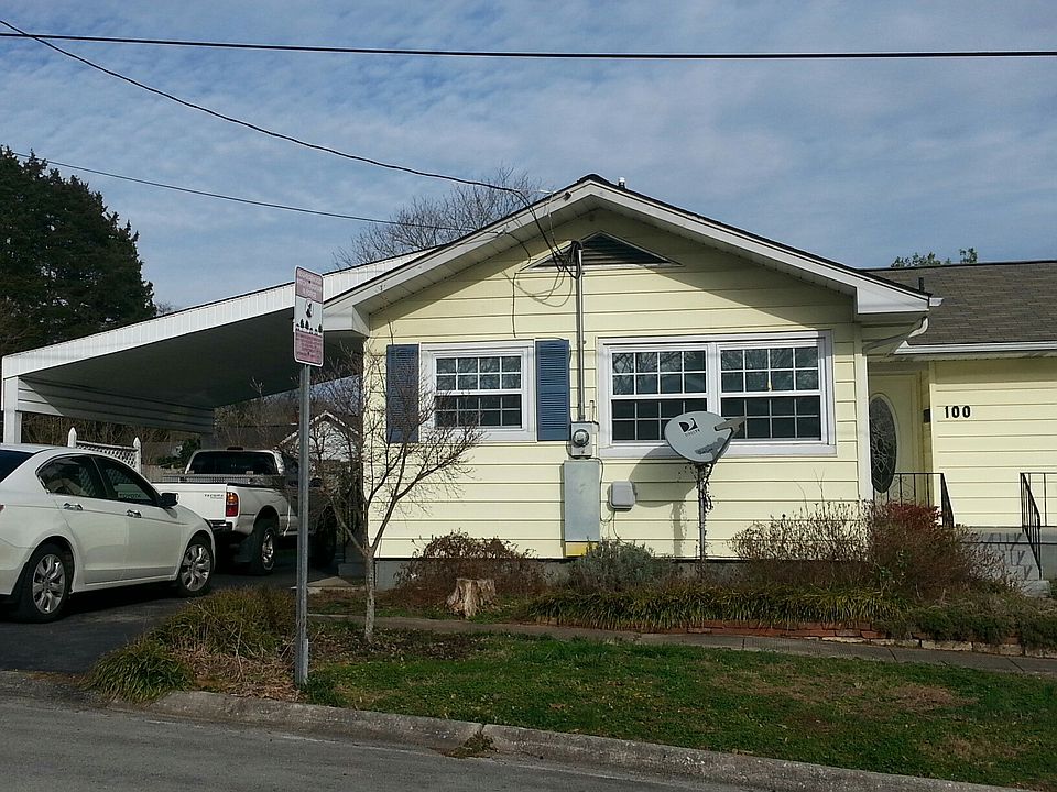 Corner lot, one car carport w/extra parking spaces