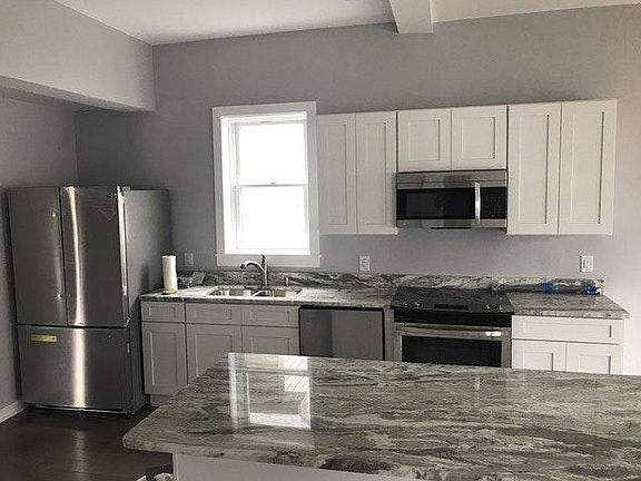 Beautiful Kitchen with Stainless Steel Appliances & Island