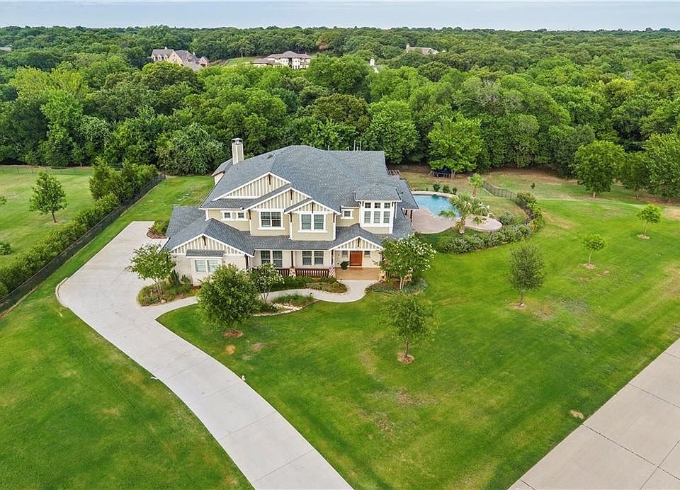 CRAFTSMAN HOME ON 2+ ACRES IN HIGHLY COVETED THREE BRIDGES!