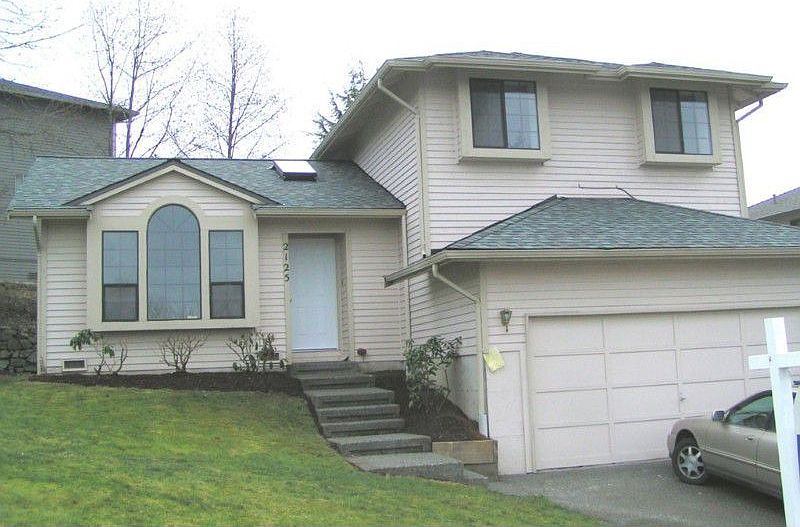 Lovely home with lots of natural light. It's even got a peek a boo view