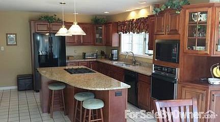 New Granite and SS Dual Sink 2014!
						:
						Cherry finished maple cabinets