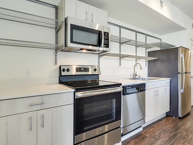 205 Kitchen pictured, 203 has same "Rio Grande" layout, finishes & features