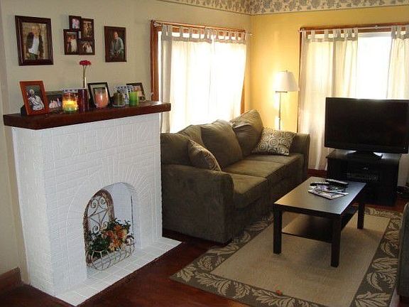 Decorative FP and hdw. floors 