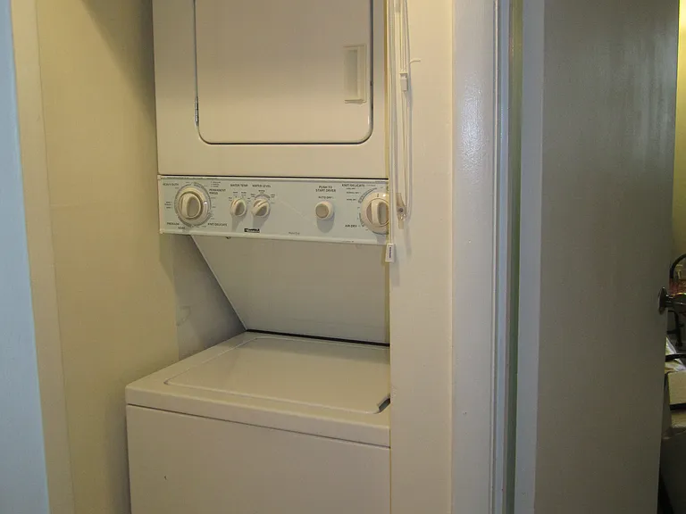 Washer-dryer in the unit.