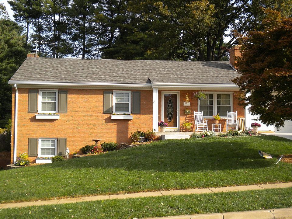 Everything updated! New roof, shutters, garage enclosed, landscaping