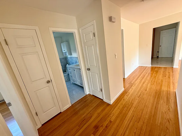 Hallway with two storage closets
