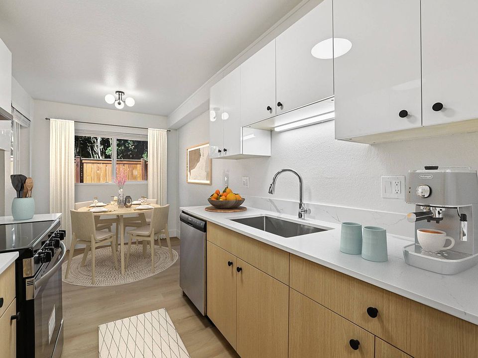 Virtually Staged Kitchen - all units come unfurnished.