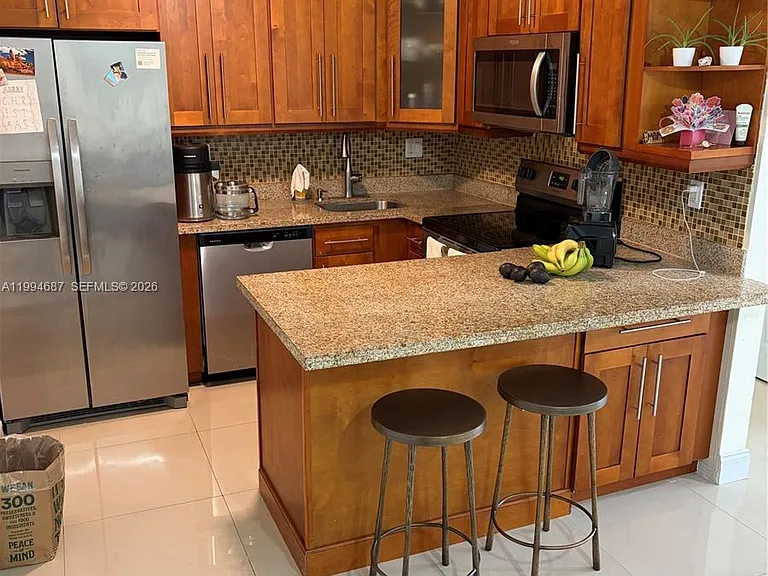 1631 NE 114th St #305 — Photo 14