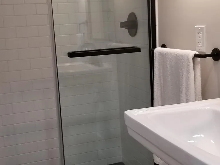 "Barn door" shower doors.