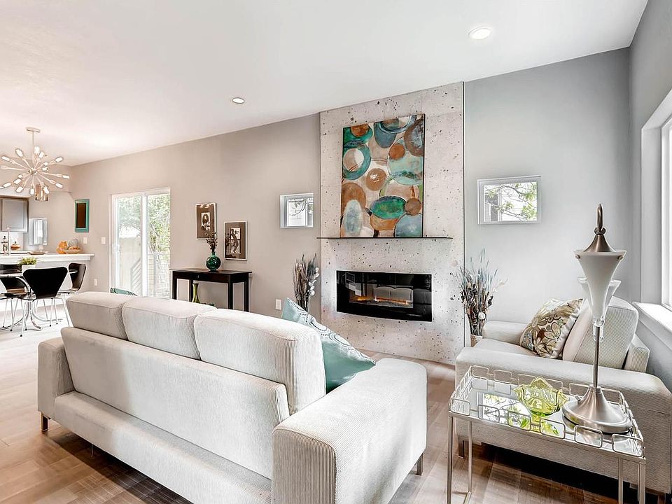Stone surround, electric fireplace, light and bright