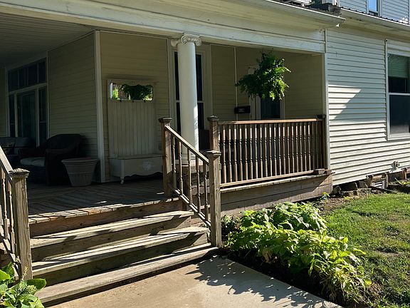 Apartment entrance is up a few steps to the right.