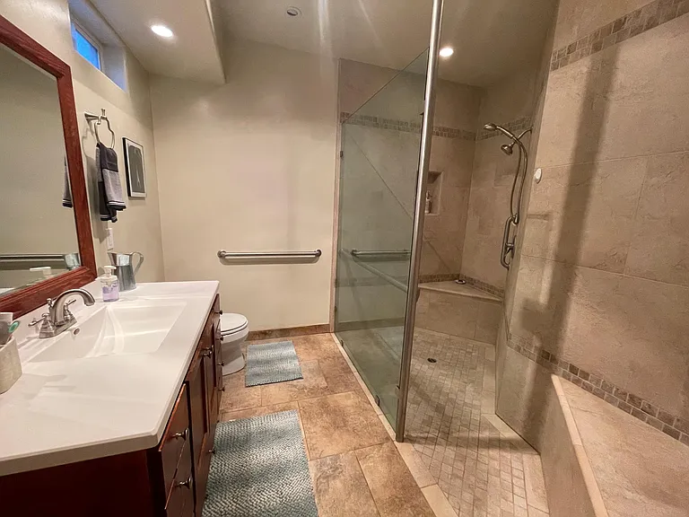 Master suite bathroom with generous walk-on shower