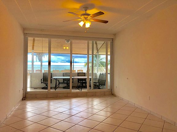 Master Bedroom Ocean front view with access to patio