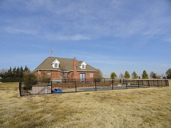 Relax in this sparkling in-ground pool
