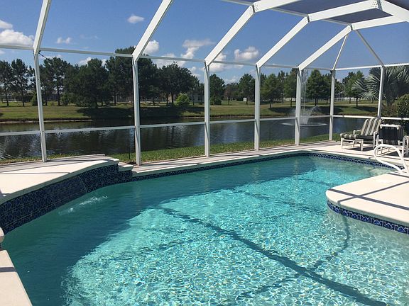 pool w/waterfall on lake