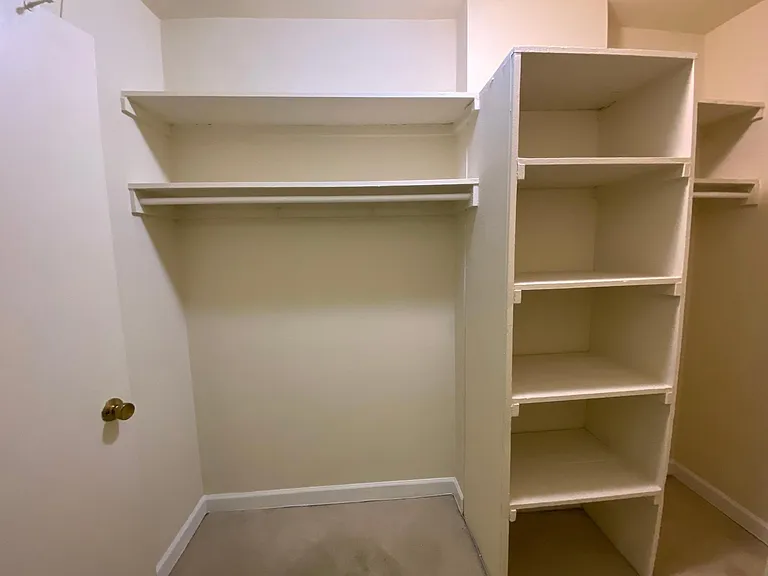 Inside the closet. It faces the bathroom entrance.