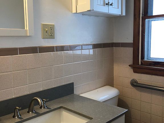 Bathroom with handicapped accessible shower.