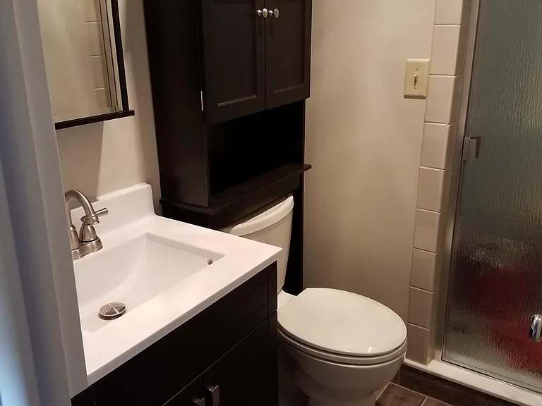 2nd bathroom with stand up tiled shower