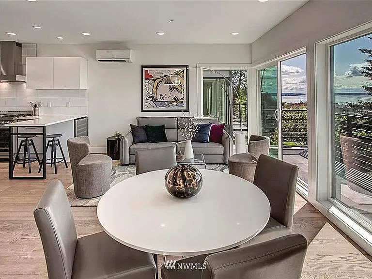 Living and dining space straight into the modern kitchen.