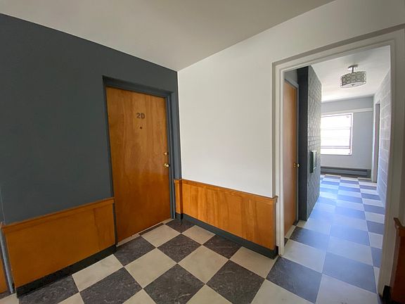 The apartment front door is located on the second floor.