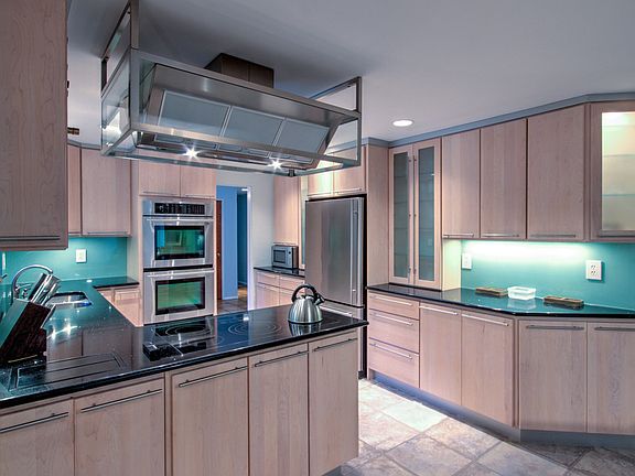 Stainless appliances are newer.  Double ovens, and counter depth built in refrigerator.