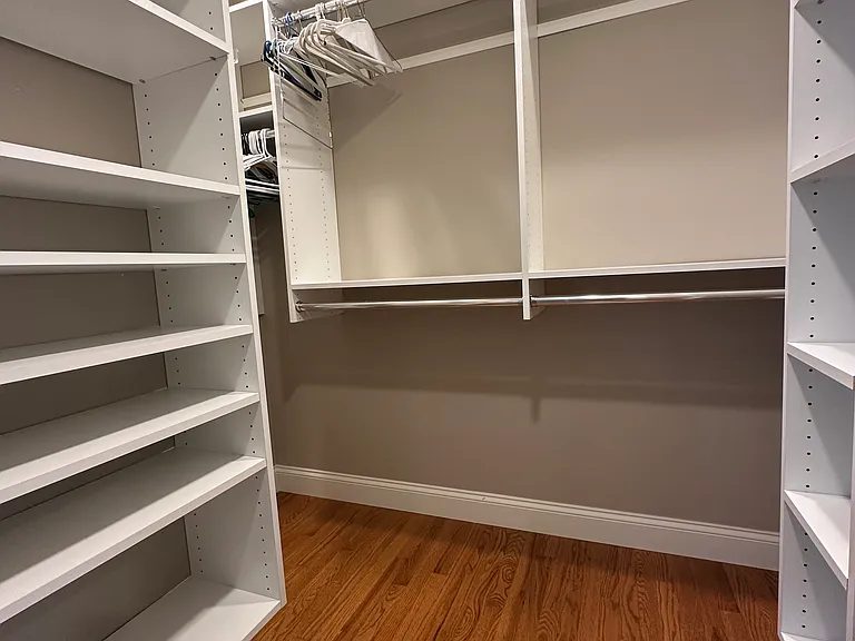 Walk-in closet in bedroom 1.