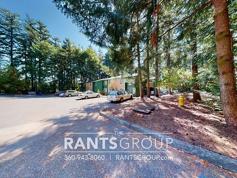 Lovely, wooded 2-bedroom apartment with a large private deck and in-unit washer & dryer! — Photo 52