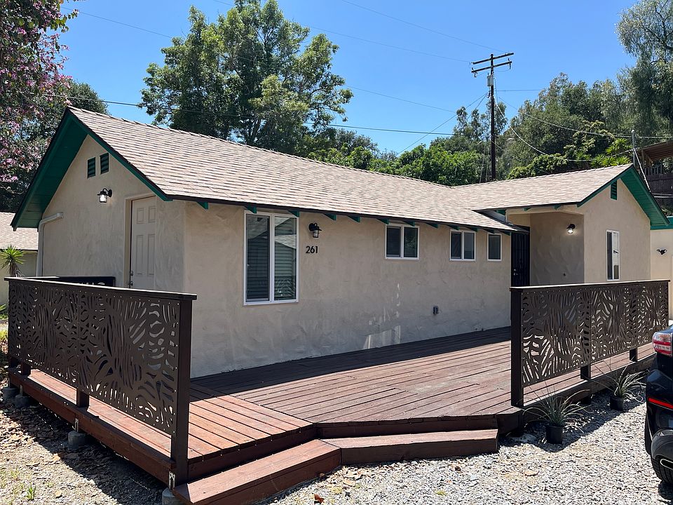 Home and expansive private deck in serene rural setting.