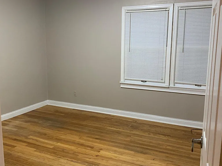Bedroom (2) with two entrances, one from hall and one from kitchen