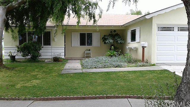 Exterior just painted, newer roof, windows, garage door.
