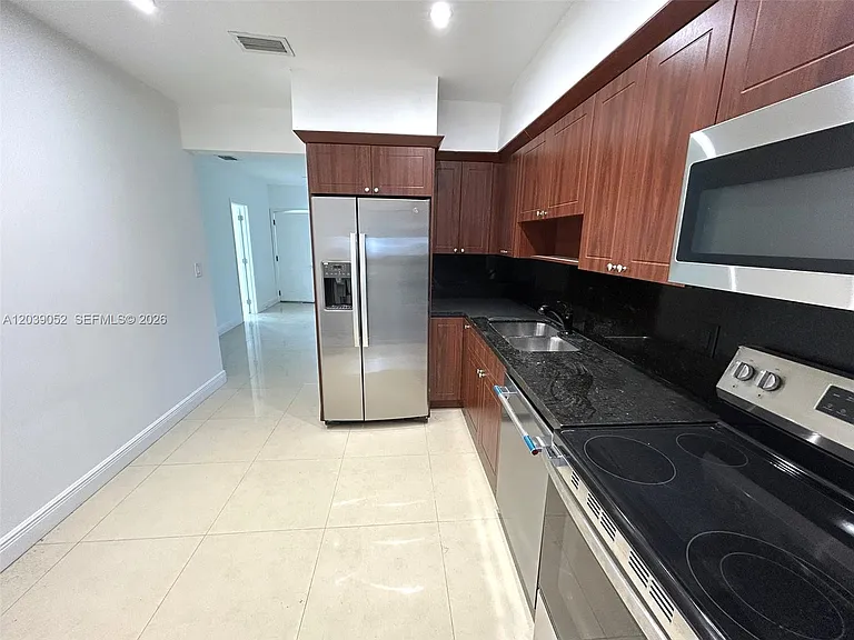 1530 NE 110th Ter #FRONT — Photo 6