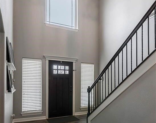 From the very moment you step through these doors - you'll be Enchanted! Soaring Ceiling Elevations, Gorgeous Hardwood Flooring and a Welcoming Feel!