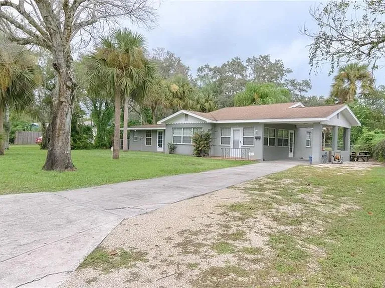 Attached carport, spacious parking area