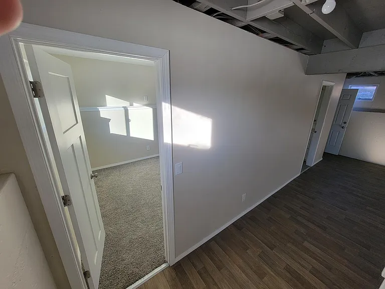down stairs entrance to bedroom