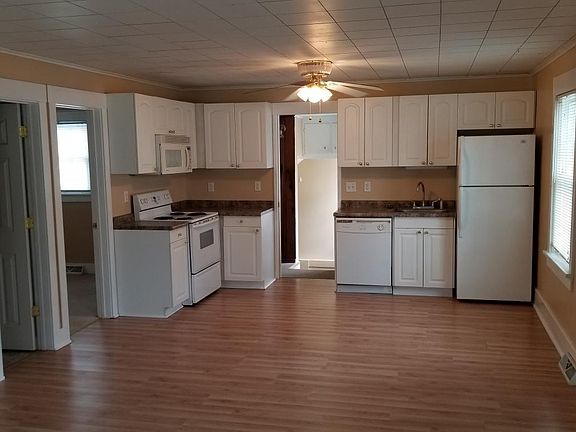 NEW WHITE KITCHEN WITH GRANITE COLORED COUNTERTOPS
