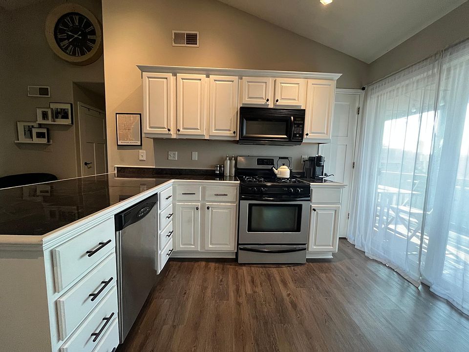 Counter tops, range, and microwave. Plenty of cabinet storage!