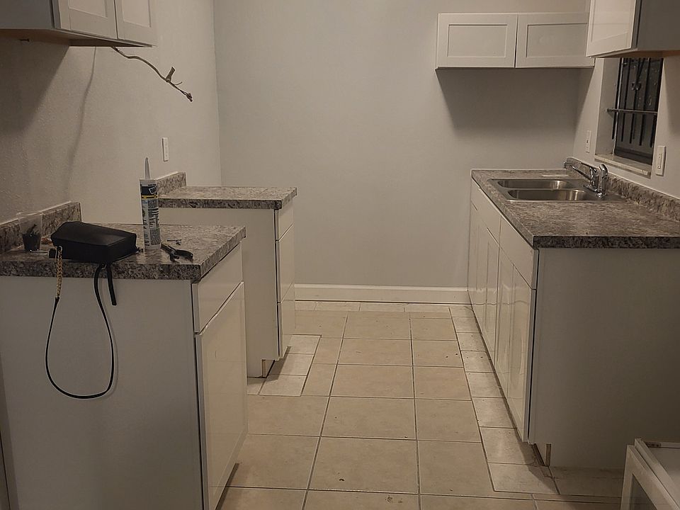 Kitchen- New appliances ( stove and fridge) will be provided