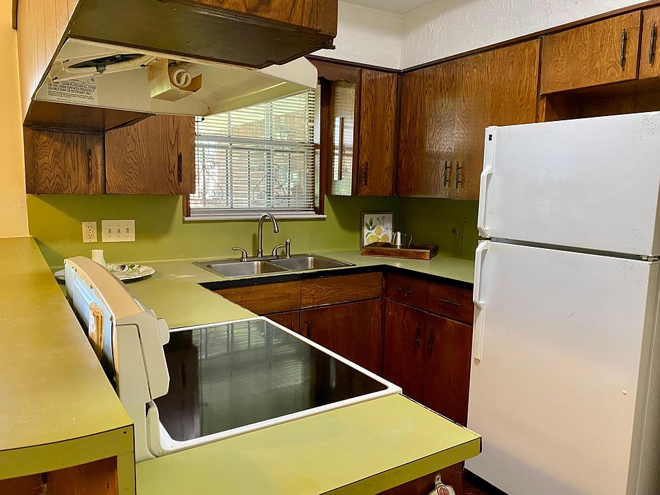 Convection top range with oven below, dishwasher, disposal, fridge and lots of storage.