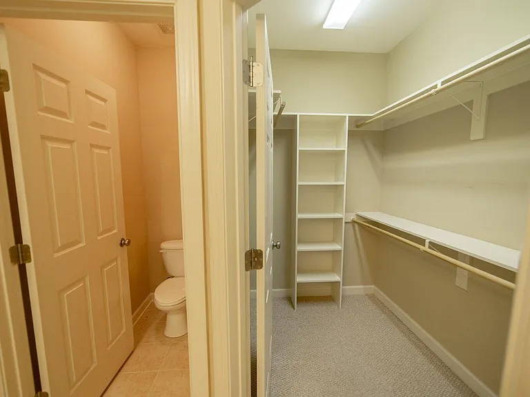 ENSUITE WALK-IN CLOSET AND COMMODE ROOM