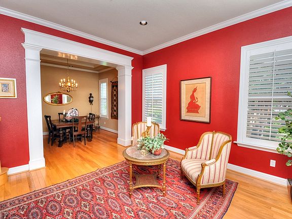 Custom Paint, Plantation Shutters Accent Formal Living and Dining Room