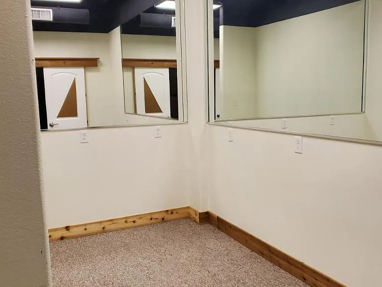 Small open bedroom off the bathroom