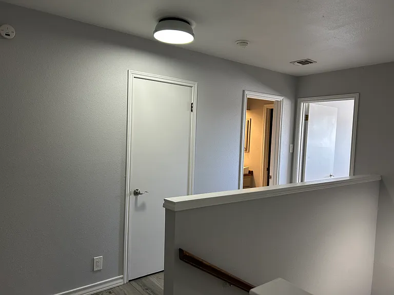 There are two more storage closets in the stair/hall entry area.