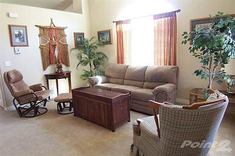 Living Room: The Living Room Invites You Home with Plush Carpeting, Vaulted Ceiling, Upgraded Ceiling Fan and More!