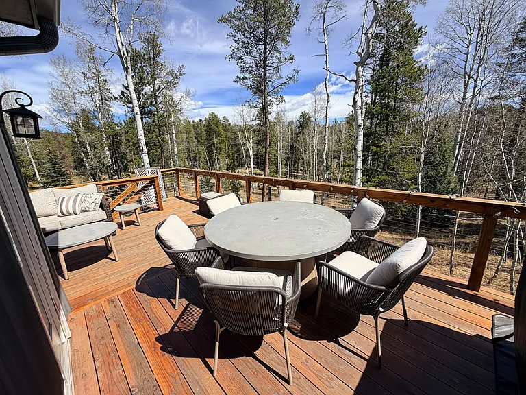 Deck area outside of kitchen/living area. No views of neighbors, stunning views