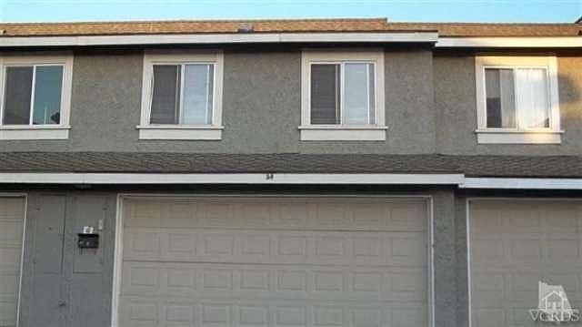 Two car attached garage with direct access to your tri-level, 2 bedroom, 1-1/2 bath home that has be