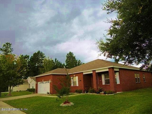 Photo 1 - front and side of home jpeg