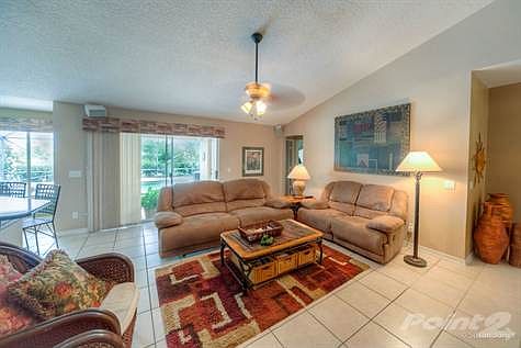 CENTRALLY LOCATED FAMILY ROOM IS DESIGNED FOR INFORMAL GATHERINGS